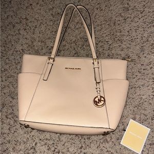 Tan Michael Kors shoulder bag.